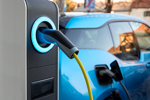 Image of an electric car in a charging port